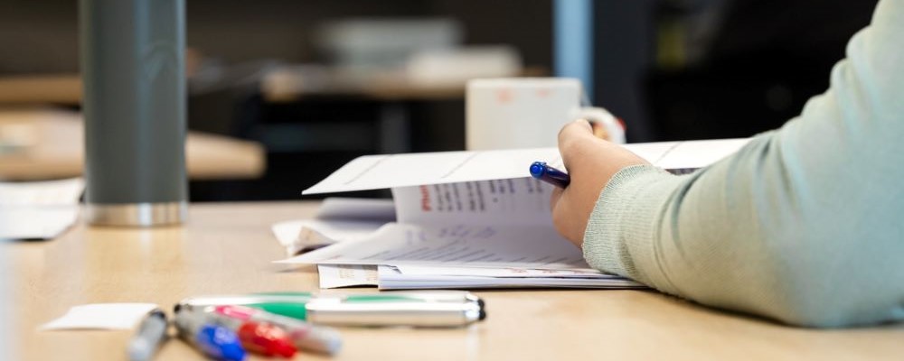 Skilled migrant studying the coursework at Evolve WA’s free five-day Workplace Readiness Training workshop.